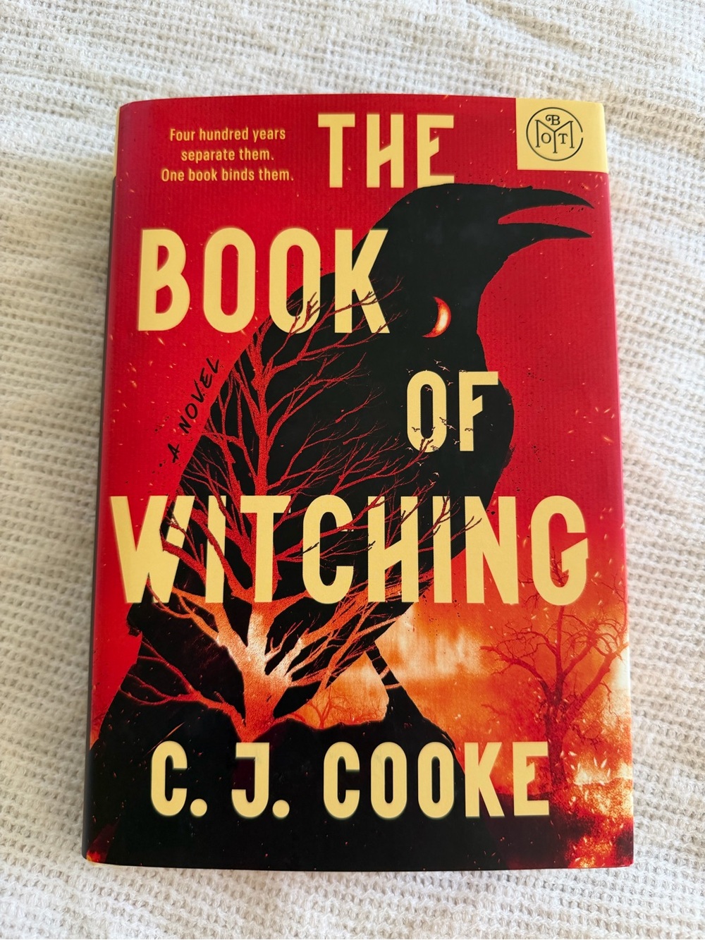Hardcover Book: The Book of Witching by C. J. Cooke - Red Paperback Novel